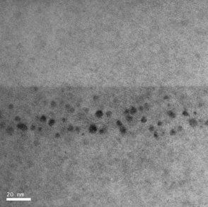 Bright field TEM image of buried arsenic clusters in a GaAs substrate